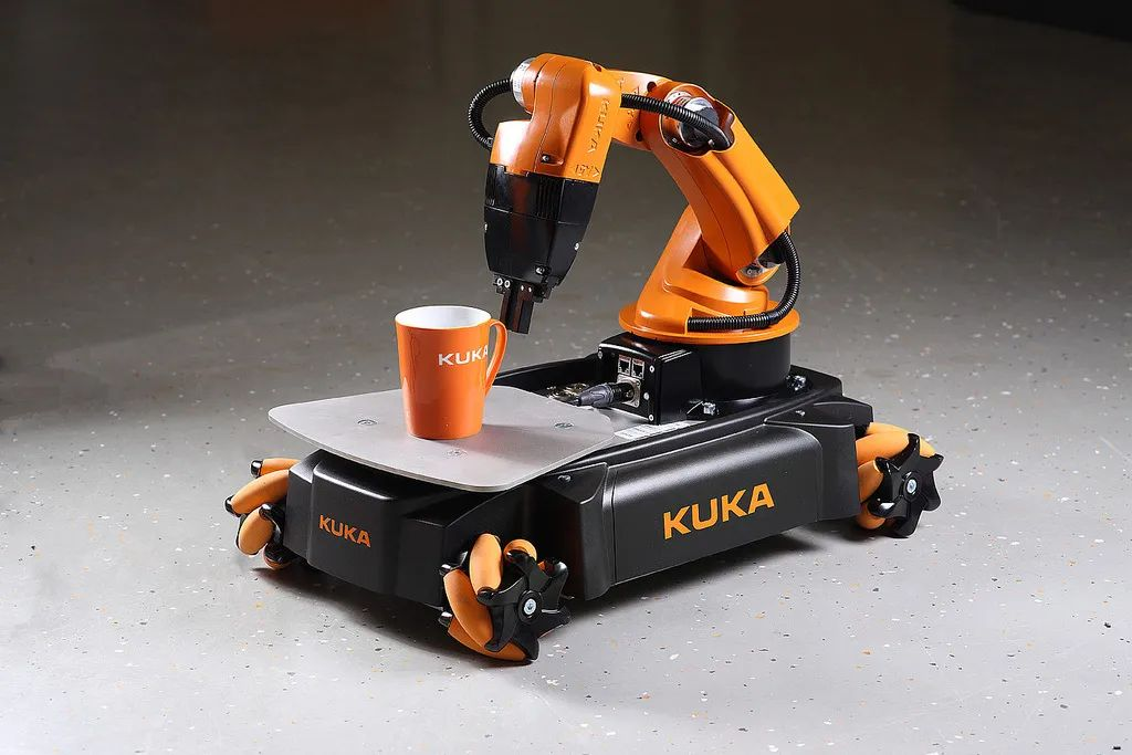 Купить роборуку. Kuka kr 1000 Titan. Промышленный робот kuka. Fanuc и kuka роботы. Робот манипулятор kuka.
